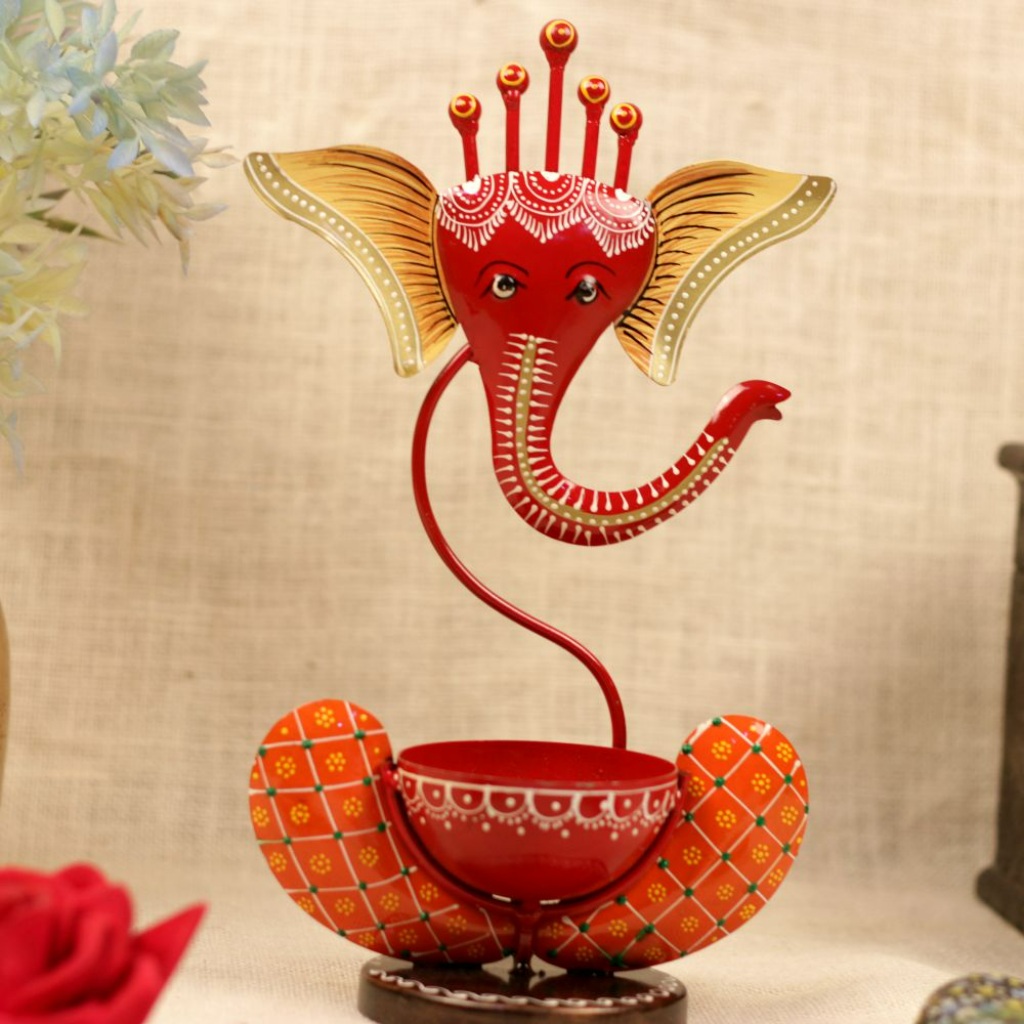 Image of Orange Iron Ganesh Tealight Holder - Handcrafted Religious Decor